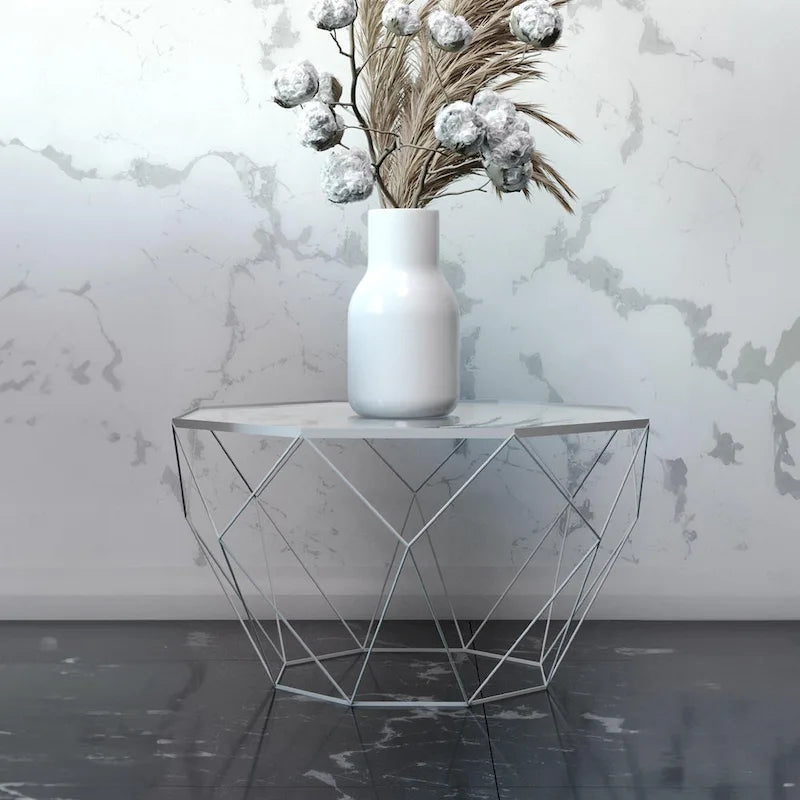 Table basse centrale octogonale moderne avec plateau en verre trempé et base géométrique en métal robuste, adaptée aux salons et aux bureaux.