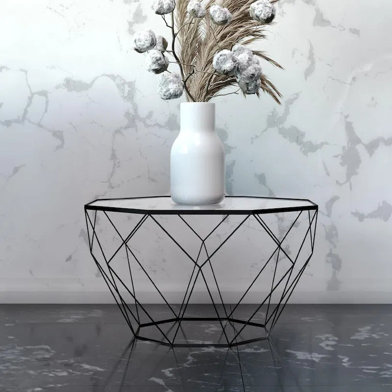 Table basse centrale octogonale moderne avec plateau en verre trempé et base géométrique en métal robuste, adaptée aux salons et aux bureaux.