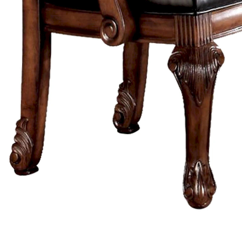 Fauteuils (lot de deux), en polyuréthane noir et bois de cerisier.